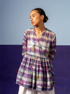 The Interior Wrap Top
